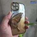 قاب گوشی آیفون 15 (کاور Unique محافظ لنز دار طرح بال پروانه آکواریومی رنگ طلایی)