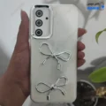 قاب گوشی سامسونگ گلکسی A35 (کاور رزینی برجسته طرح پاپیون رنگ شیری)