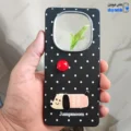 قاب گوشی شیائومی ردمی نوت 14 پرو 4G (کاور عروسکی Jumpmoon طرح هاپو رنگ مشکی با گوی قرمز)